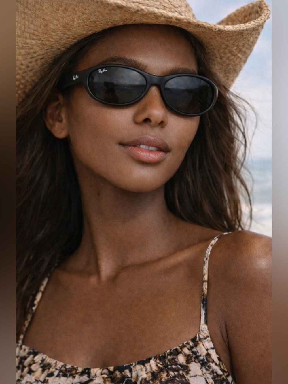 Ray-Ban Black Frame Sunglasses with Dark Lenses and Maui Jim Case